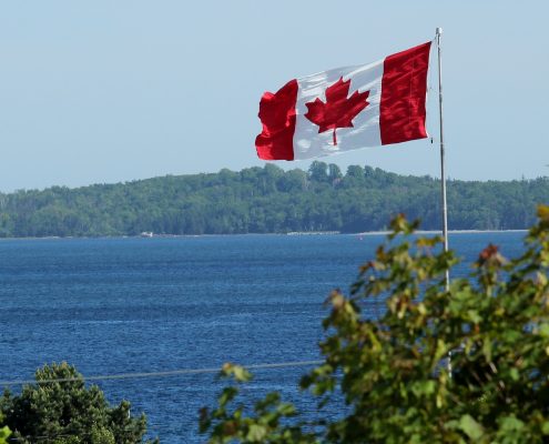SPIVAS-Immigration-Canada-flag-lake
